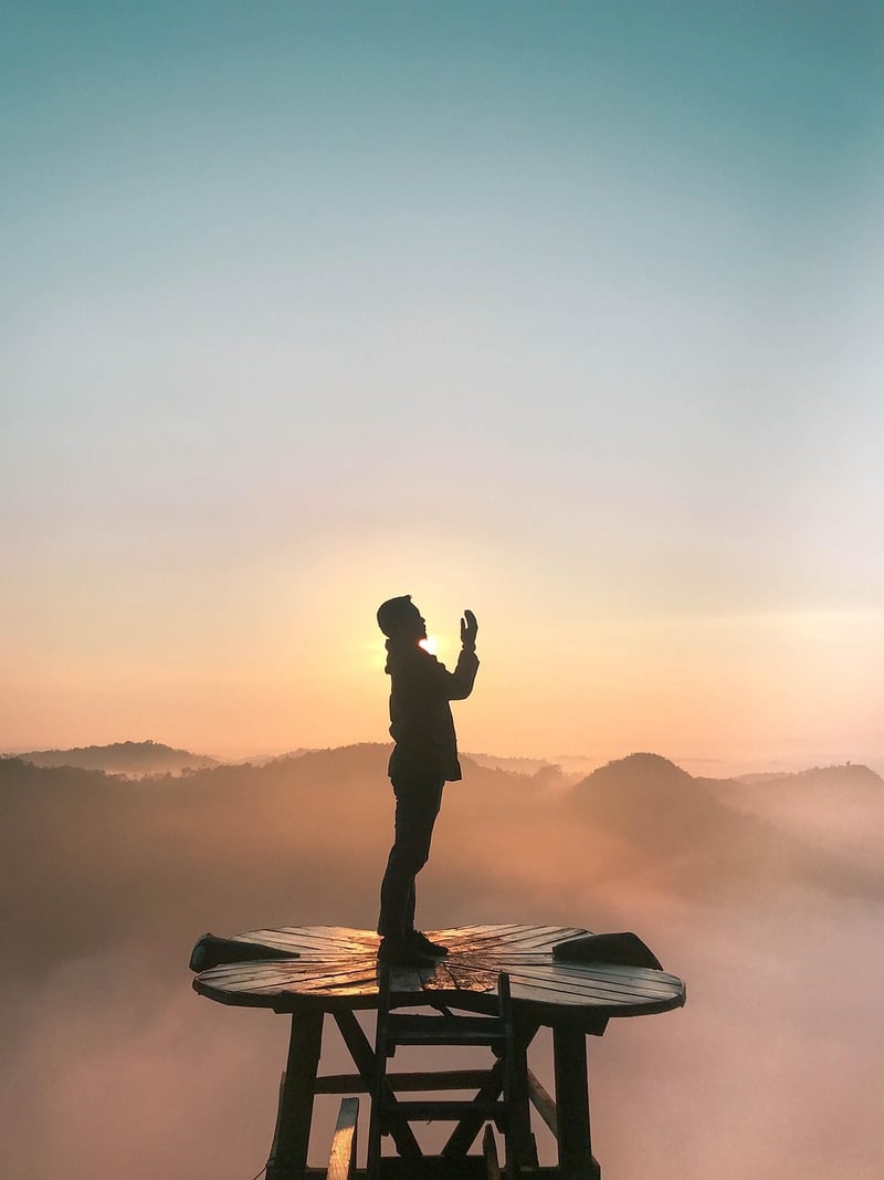 Woman practicing self-care at sunrise